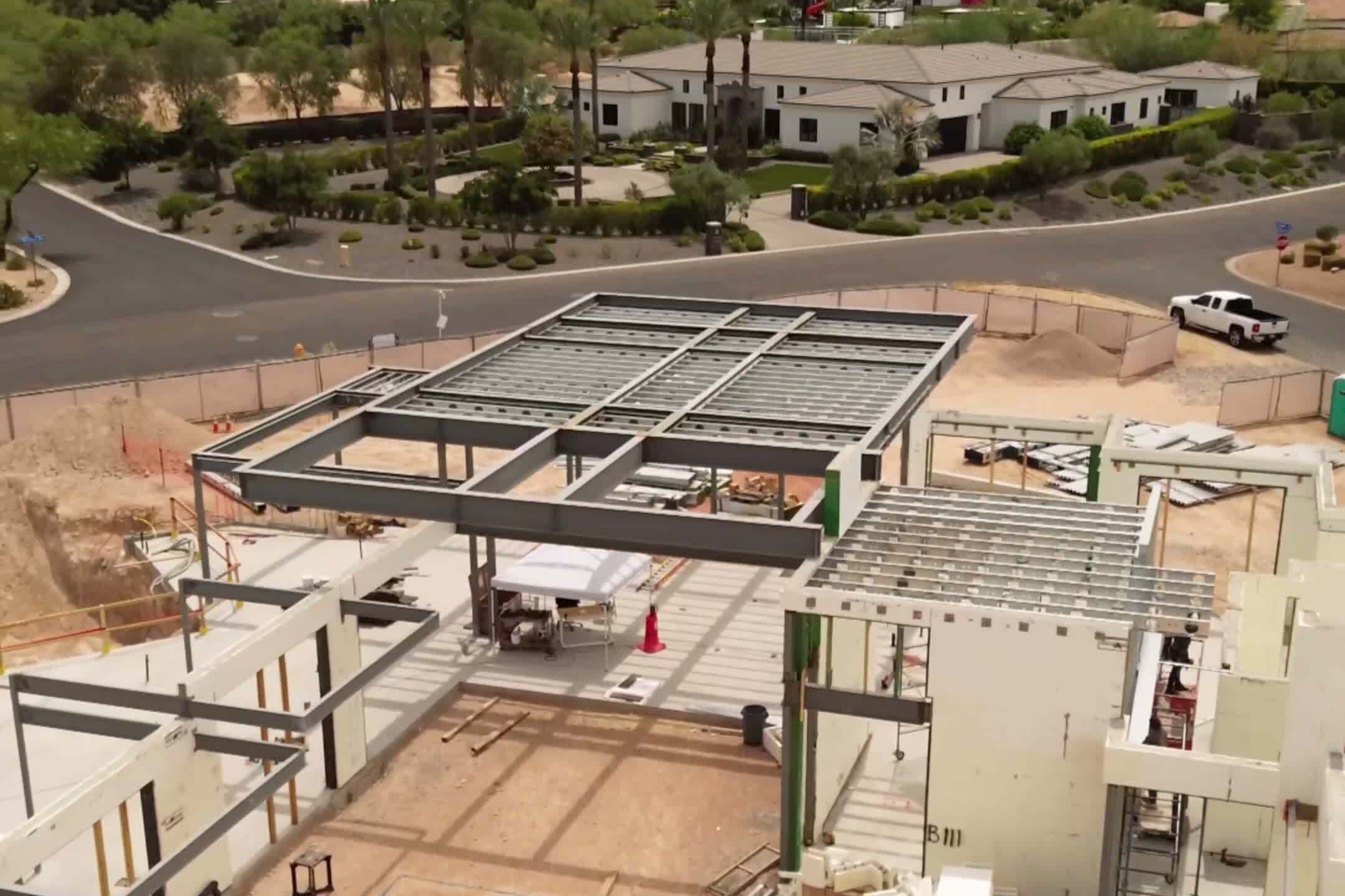 Aerial view of structural steel framing on a ground-up custom home in Paradise Valley by Saddlewood Contracting